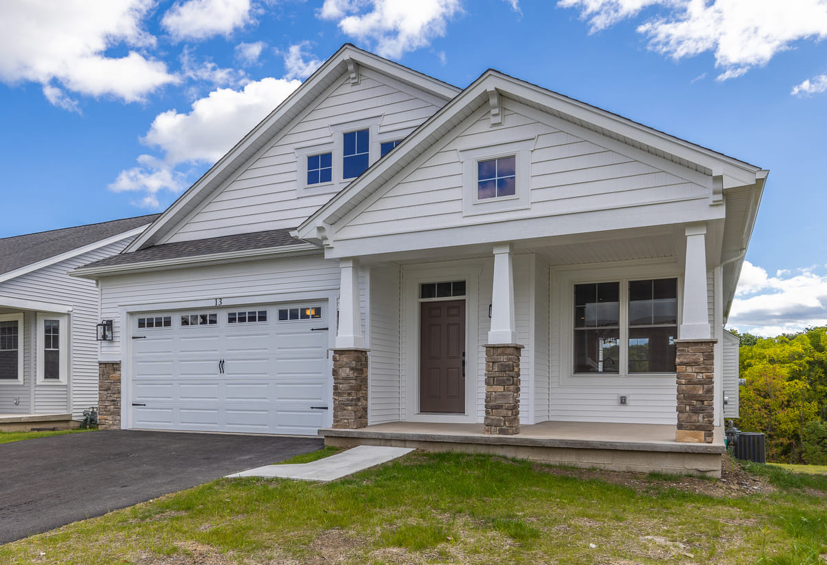 The Cottages of Canandaigua new construction home with attached garage by Gerber Homes